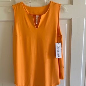 LuLu-B Keyhole sleeveless medium top in a beautiful Clementine color. NWT